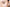 Woman using stem cell skincare products on her face